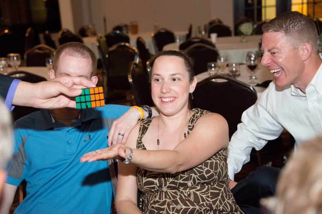 Magician Steven Brundage amazes guests with his Rubik's Cube magic